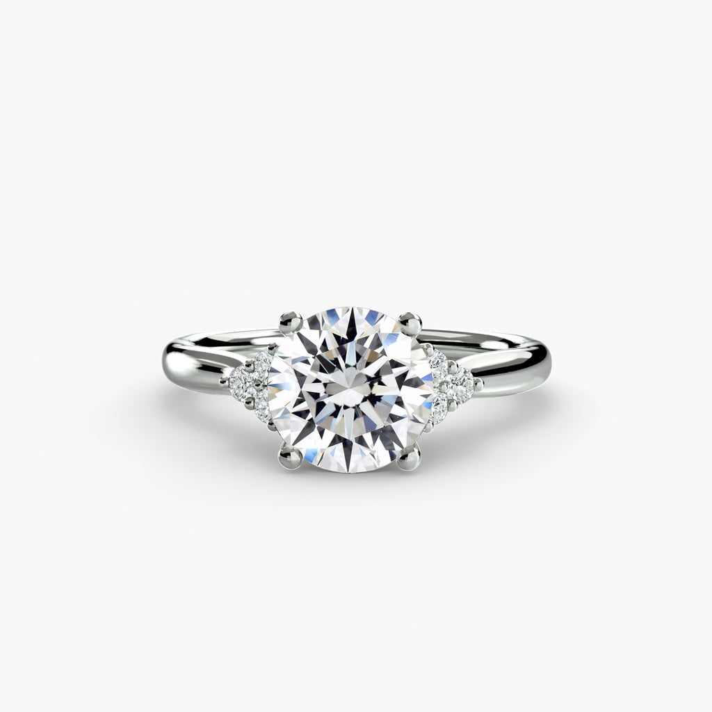 Solitaire Ring with Cluster Shoulders